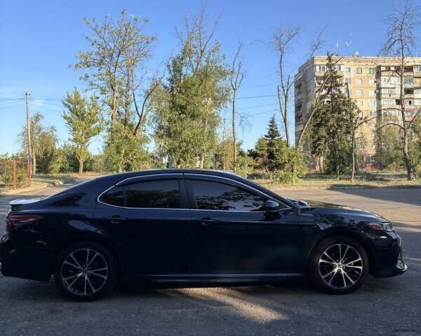 Синий Тойота Камри, объемом двигателя 2.49 л и пробегом 172 тыс. км за 18500 $, фото 6 на Automoto.ua