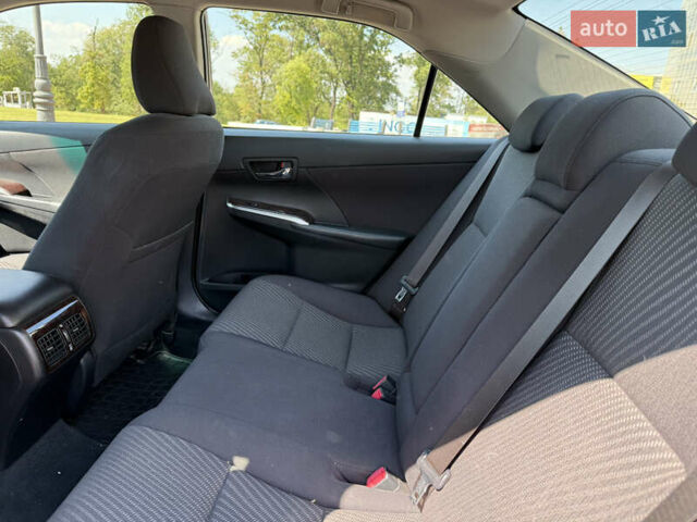 Синій Тойота Камрі, об'ємом двигуна 2.5 л та пробігом 86 тис. км за 17500 $, фото 17 на Automoto.ua