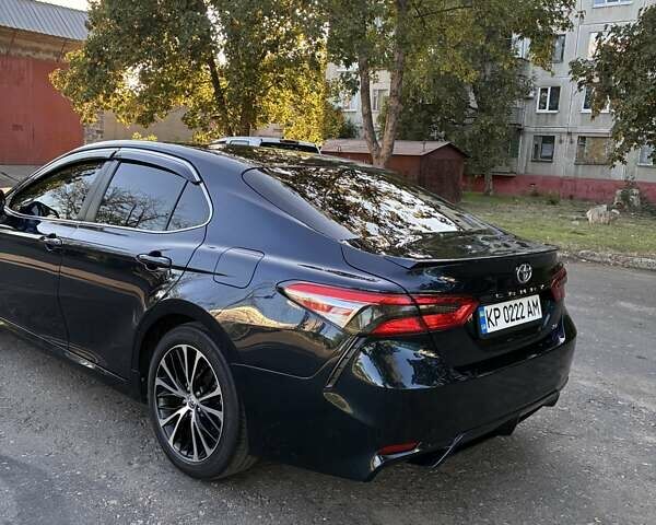 Синий Тойота Камри, объемом двигателя 2.49 л и пробегом 172 тыс. км за 18500 $, фото 4 на Automoto.ua