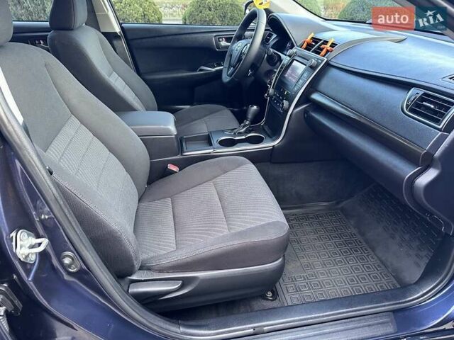 Синий Тойота Камри, объемом двигателя 2.5 л и пробегом 170 тыс. км за 12900 $, фото 21 на Automoto.ua