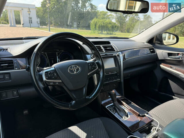 Синій Тойота Камрі, об'ємом двигуна 2.5 л та пробігом 86 тис. км за 17500 $, фото 19 на Automoto.ua