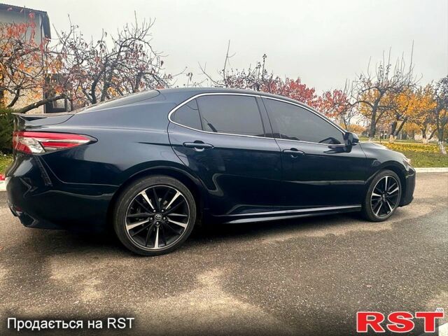 Синій Тойота Камрі, об'ємом двигуна 2.5 л та пробігом 140 тис. км за 19000 $, фото 1 на Automoto.ua