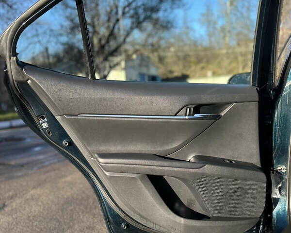 Синій Тойота Камрі, об'ємом двигуна 2.49 л та пробігом 100 тис. км за 19000 $, фото 12 на Automoto.ua