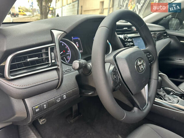 Синий Тойота Камри, объемом двигателя 2.49 л и пробегом 198 тыс. км за 19700 $, фото 24 на Automoto.ua