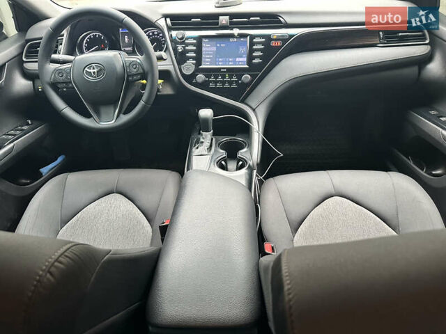 Синий Тойота Камри, объемом двигателя 2.49 л и пробегом 198 тыс. км за 19700 $, фото 37 на Automoto.ua