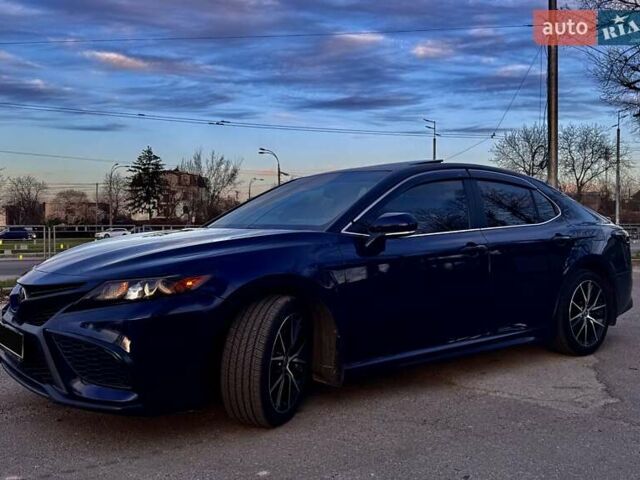 Синий Тойота Камри, объемом двигателя 2.49 л и пробегом 83 тыс. км за 23600 $, фото 1 на Automoto.ua