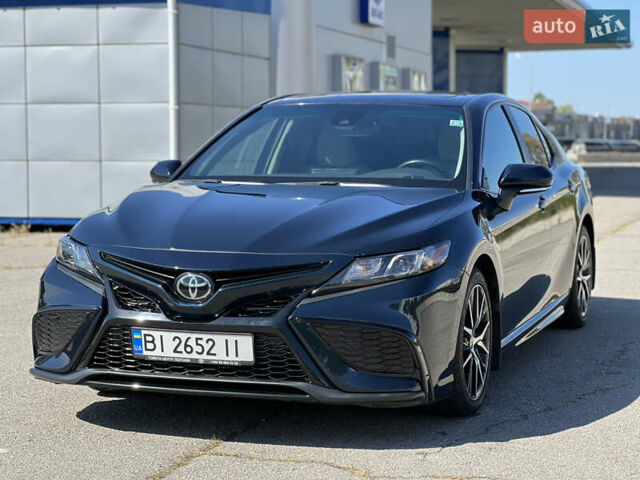 Синий Тойота Камри, объемом двигателя 2.49 л и пробегом 90 тыс. км за 24999 $, фото 1 на Automoto.ua