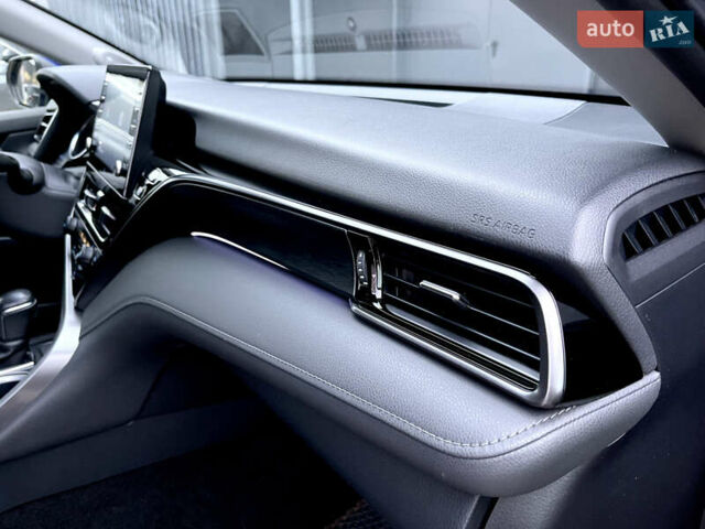 Синій Тойота Камрі, об'ємом двигуна 2.49 л та пробігом 75 тис. км за 33000 $, фото 45 на Automoto.ua