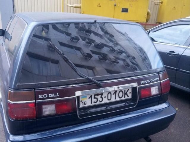 Синій Тойота Камрі, об'ємом двигуна 2 л та пробігом 400 тис. км за 2200 $, фото 2 на Automoto.ua