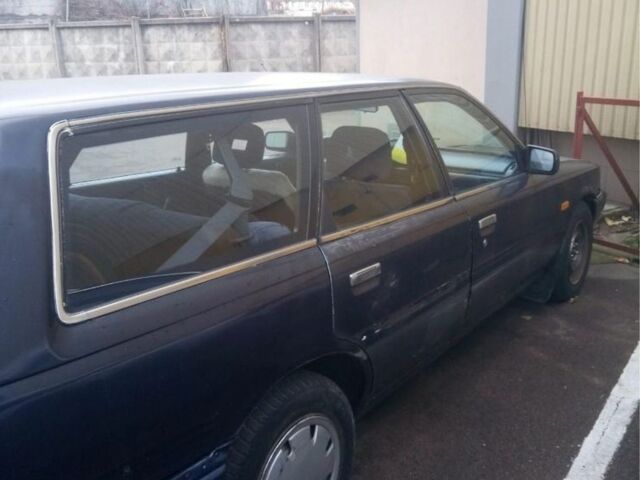 Синій Тойота Камрі, об'ємом двигуна 2 л та пробігом 400 тис. км за 2200 $, фото 1 на Automoto.ua