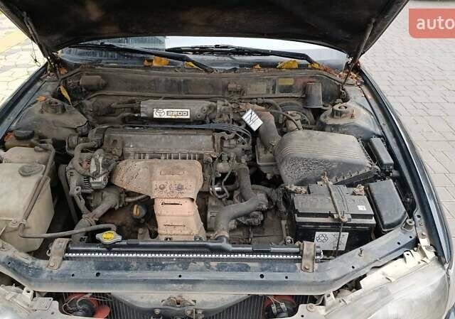 Зелений Тойота Камрі, об'ємом двигуна 2.2 л та пробігом 300 тис. км за 2100 $, фото 5 на Automoto.ua