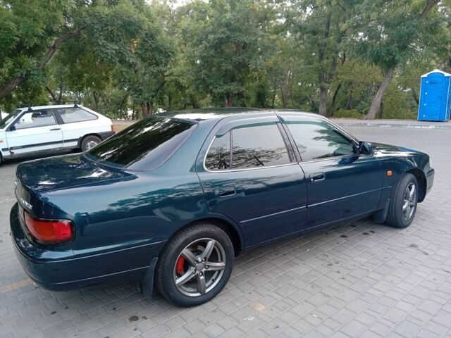 Зелений Тойота Камрі, об'ємом двигуна 2.2 л та пробігом 400 тис. км за 3600 $, фото 5 на Automoto.ua