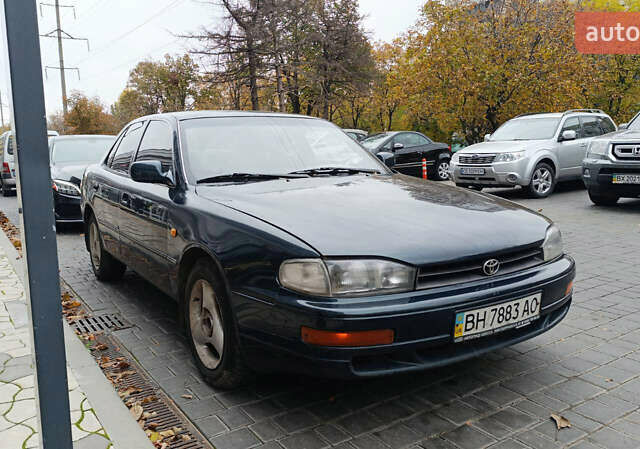 Зелений Тойота Камрі, об'ємом двигуна 2.2 л та пробігом 300 тис. км за 2100 $, фото 4 на Automoto.ua