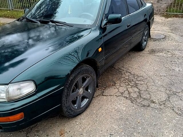 Зелений Тойота Камрі, об'ємом двигуна 2.2 л та пробігом 350 тис. км за 2150 $, фото 3 на Automoto.ua