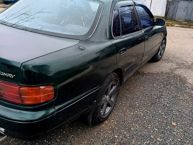 Зелений Тойота Камрі, об'ємом двигуна 2.2 л та пробігом 350 тис. км за 2150 $, фото 4 на Automoto.ua