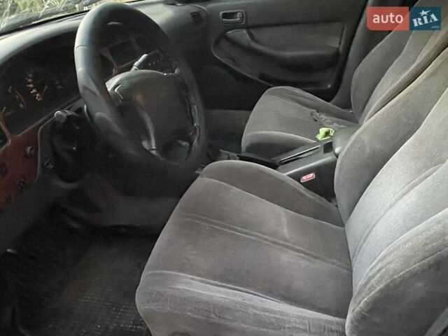 Зелений Тойота Камрі, об'ємом двигуна 3 л та пробігом 400 тис. км за 2800 $, фото 2 на Automoto.ua