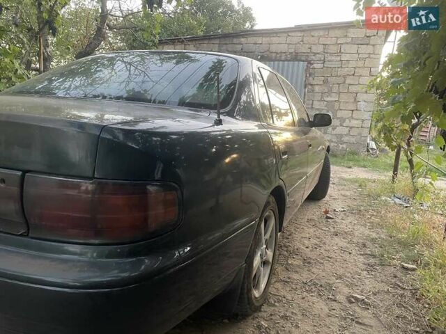 Зелений Тойота Камрі, об'ємом двигуна 3 л та пробігом 400 тис. км за 2800 $, фото 4 на Automoto.ua