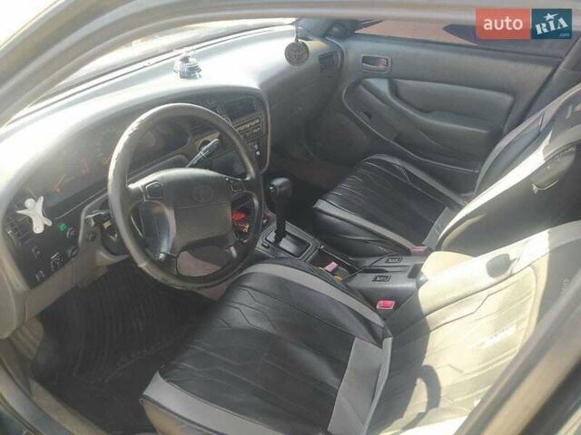 Зеленый Тойота Камри, объемом двигателя 3 л и пробегом 347 тыс. км за 2800 $, фото 4 на Automoto.ua