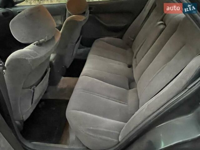 Зелений Тойота Камрі, об'ємом двигуна 3 л та пробігом 400 тис. км за 2800 $, фото 8 на Automoto.ua