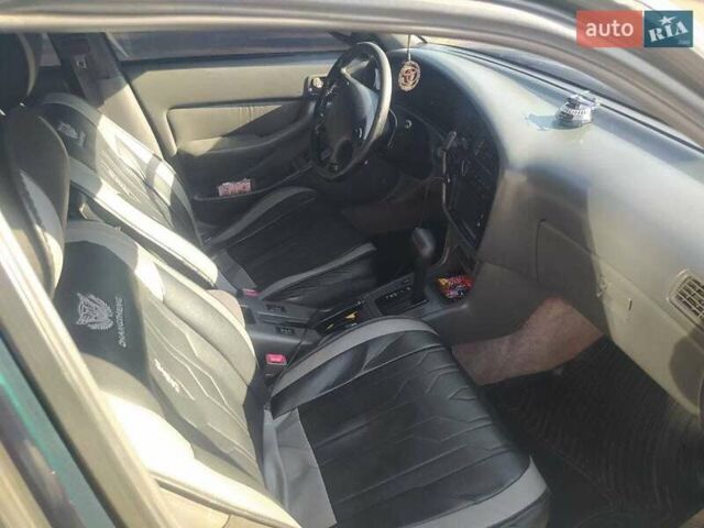 Зеленый Тойота Камри, объемом двигателя 3 л и пробегом 347 тыс. км за 2800 $, фото 3 на Automoto.ua