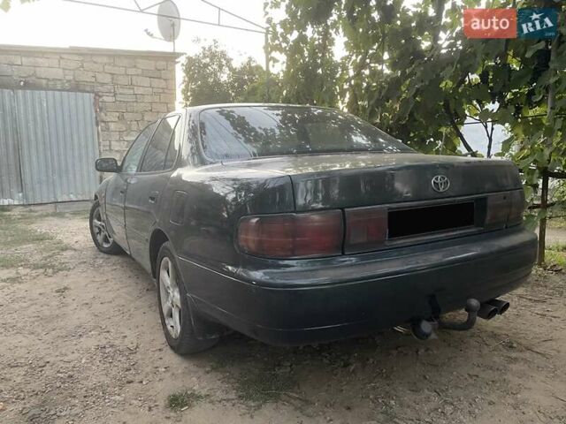 Зелений Тойота Камрі, об'ємом двигуна 3 л та пробігом 400 тис. км за 2800 $, фото 5 на Automoto.ua