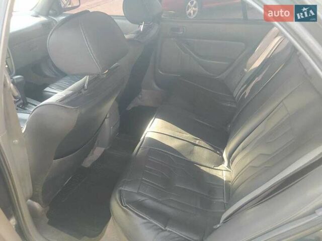 Зеленый Тойота Камри, объемом двигателя 3 л и пробегом 347 тыс. км за 2800 $, фото 5 на Automoto.ua