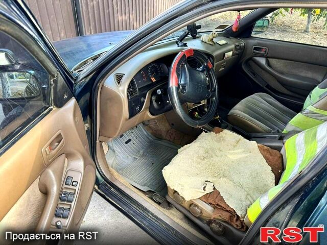 Зеленый Тойота Камри, объемом двигателя 2.2 л и пробегом 235 тыс. км за 2100 $, фото 6 на Automoto.ua