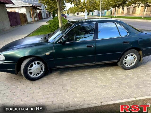 Зеленый Тойота Камри, объемом двигателя 2.2 л и пробегом 235 тыс. км за 2100 $, фото 4 на Automoto.ua