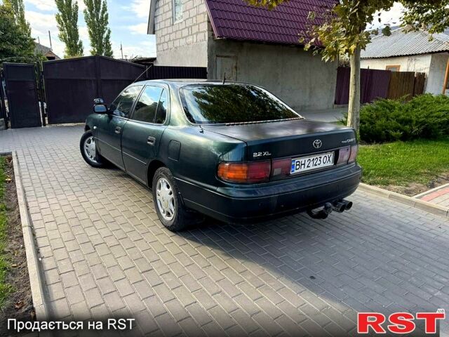 Зеленый Тойота Камри, объемом двигателя 2.2 л и пробегом 235 тыс. км за 2100 $, фото 3 на Automoto.ua