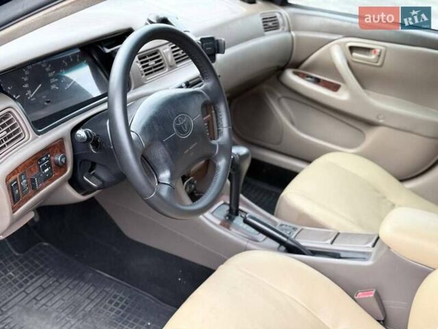 Зеленый Тойота Камри, объемом двигателя 3 л и пробегом 255 тыс. км за 4999 $, фото 7 на Automoto.ua