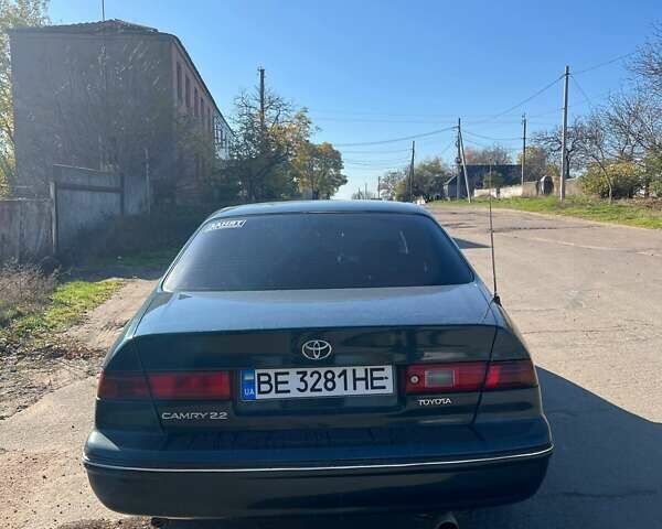 Зеленый Тойота Камри, объемом двигателя 2.16 л и пробегом 407 тыс. км за 3700 $, фото 7 на Automoto.ua