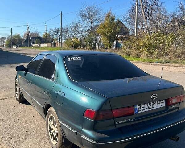 Зеленый Тойота Камри, объемом двигателя 2.16 л и пробегом 407 тыс. км за 3700 $, фото 6 на Automoto.ua