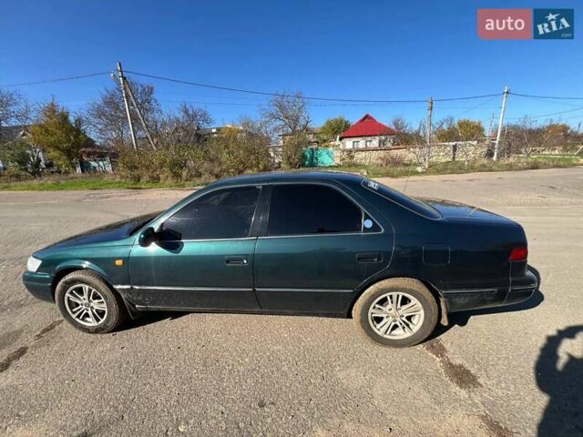 Зеленый Тойота Камри, объемом двигателя 2.16 л и пробегом 407 тыс. км за 3700 $, фото 10 на Automoto.ua