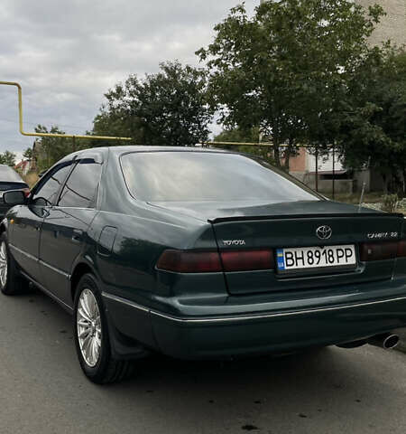 Зеленый Тойота Камри, объемом двигателя 2.2 л и пробегом 466 тыс. км за 3800 $, фото 3 на Automoto.ua