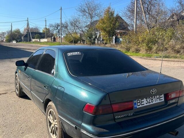 Зеленый Тойота Камри, объемом двигателя 2.2 л и пробегом 407 тыс. км за 3700 $, фото 4 на Automoto.ua