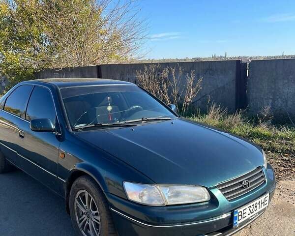 Зеленый Тойота Камри, объемом двигателя 2.16 л и пробегом 407 тыс. км за 3700 $, фото 3 на Automoto.ua