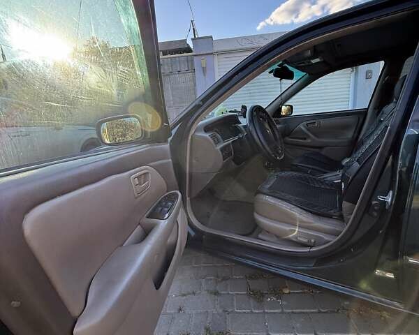 Зелений Тойота Камрі, об'ємом двигуна 3 л та пробігом 394 тис. км за 3900 $, фото 12 на Automoto.ua