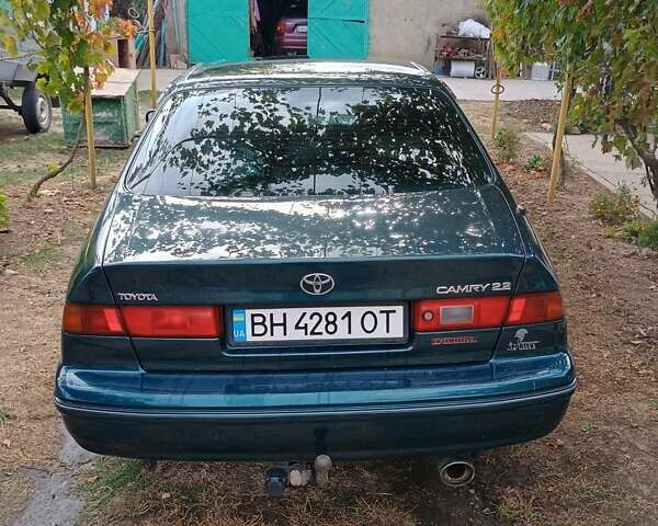 Зелений Тойота Камрі, об'ємом двигуна 2.16 л та пробігом 300 тис. км за 3300 $, фото 4 на Automoto.ua