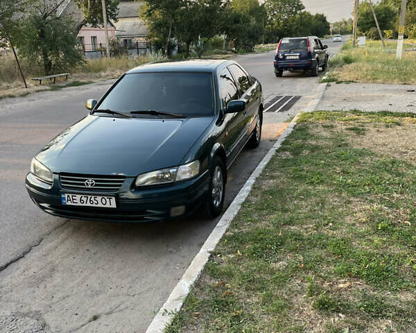 Зеленый Тойота Камри, объемом двигателя 2.2 л и пробегом 700 тыс. км за 5000 $, фото 5 на Automoto.ua