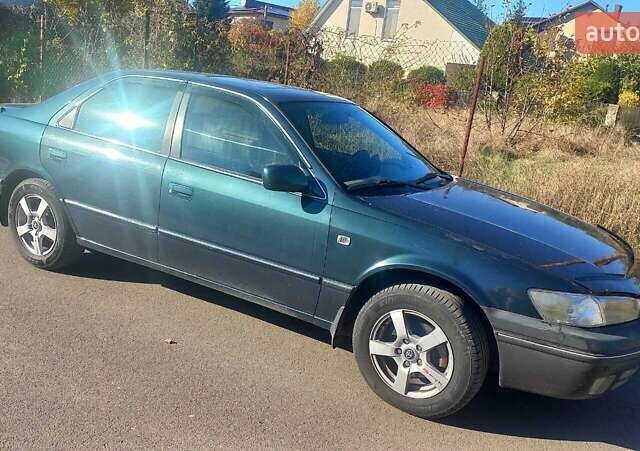 Зелений Тойота Камрі, об'ємом двигуна 3 л та пробігом 394 тис. км за 3900 $, фото 5 на Automoto.ua