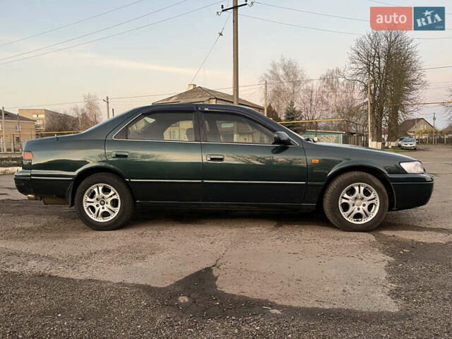 Зеленый Тойота Камри, объемом двигателя 3 л и пробегом 355 тыс. км за 3400 $, фото 2 на Automoto.ua