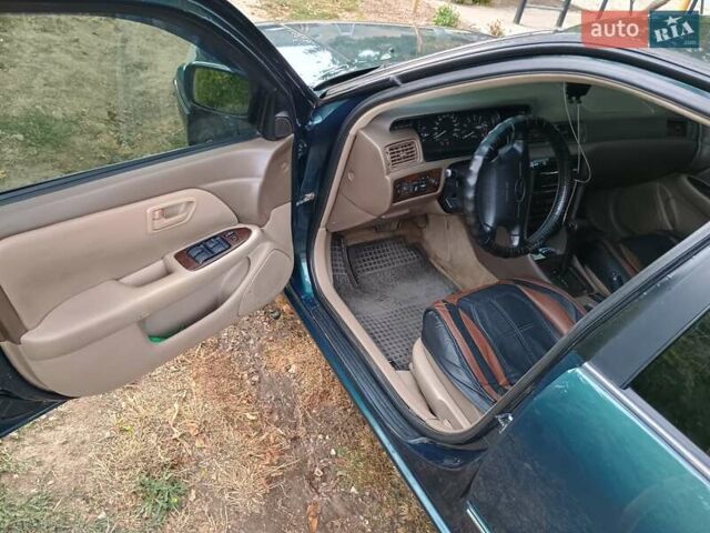 Зелений Тойота Камрі, об'ємом двигуна 2.16 л та пробігом 300 тис. км за 3300 $, фото 9 на Automoto.ua