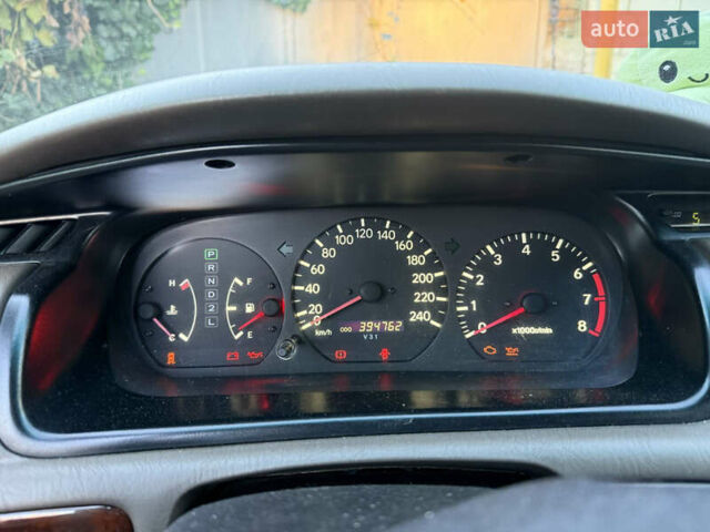 Зелений Тойота Камрі, об'ємом двигуна 3 л та пробігом 394 тис. км за 3900 $, фото 16 на Automoto.ua