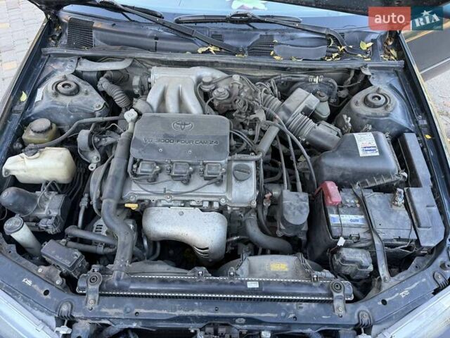 Зелений Тойота Камрі, об'ємом двигуна 3 л та пробігом 394 тис. км за 3900 $, фото 13 на Automoto.ua