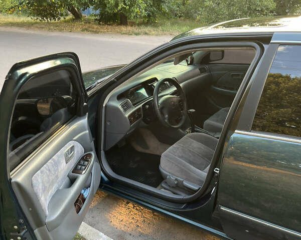 Зеленый Тойота Камри, объемом двигателя 2.2 л и пробегом 700 тыс. км за 5000 $, фото 12 на Automoto.ua