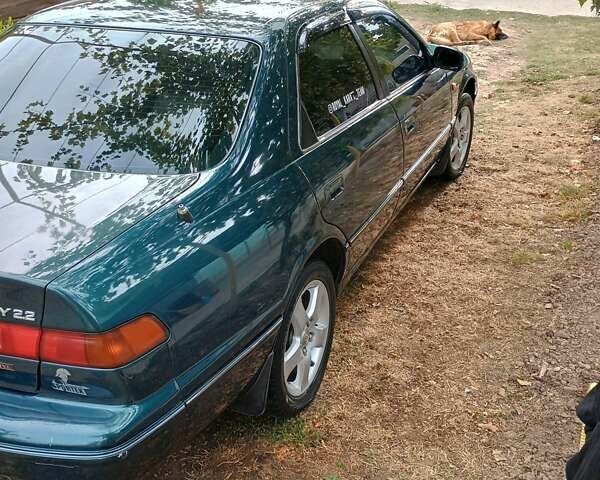 Зелений Тойота Камрі, об'ємом двигуна 2.16 л та пробігом 300 тис. км за 3300 $, фото 3 на Automoto.ua