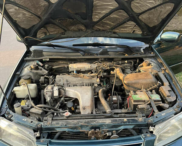 Зеленый Тойота Камри, объемом двигателя 2.2 л и пробегом 700 тыс. км за 5000 $, фото 19 на Automoto.ua