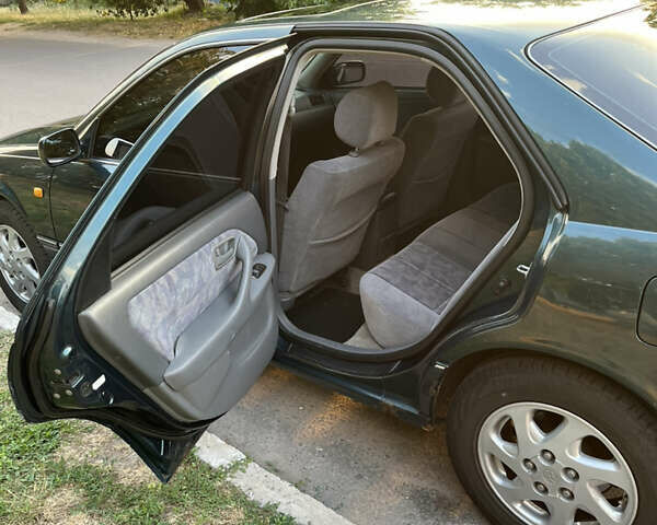 Зеленый Тойота Камри, объемом двигателя 2.2 л и пробегом 700 тыс. км за 5000 $, фото 10 на Automoto.ua