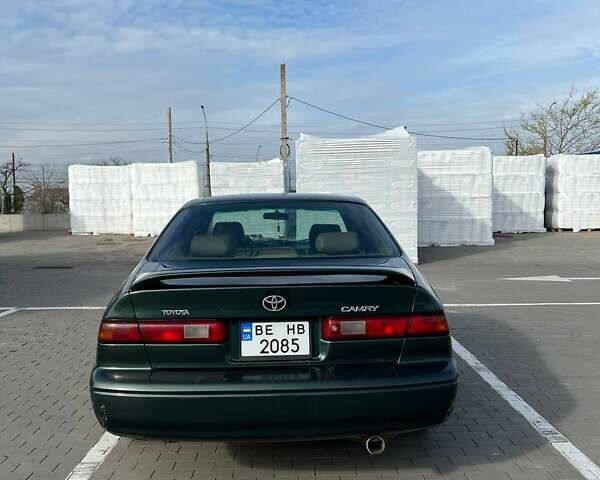 Зеленый Тойота Камри, объемом двигателя 2.2 л и пробегом 310 тыс. км за 3400 $, фото 5 на Automoto.ua