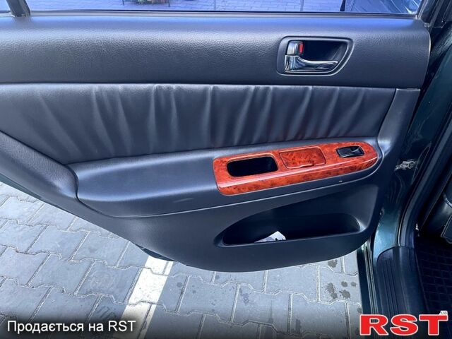 Зеленый Тойота Камри, объемом двигателя 3 л и пробегом 384 тыс. км за 6500 $, фото 6 на Automoto.ua